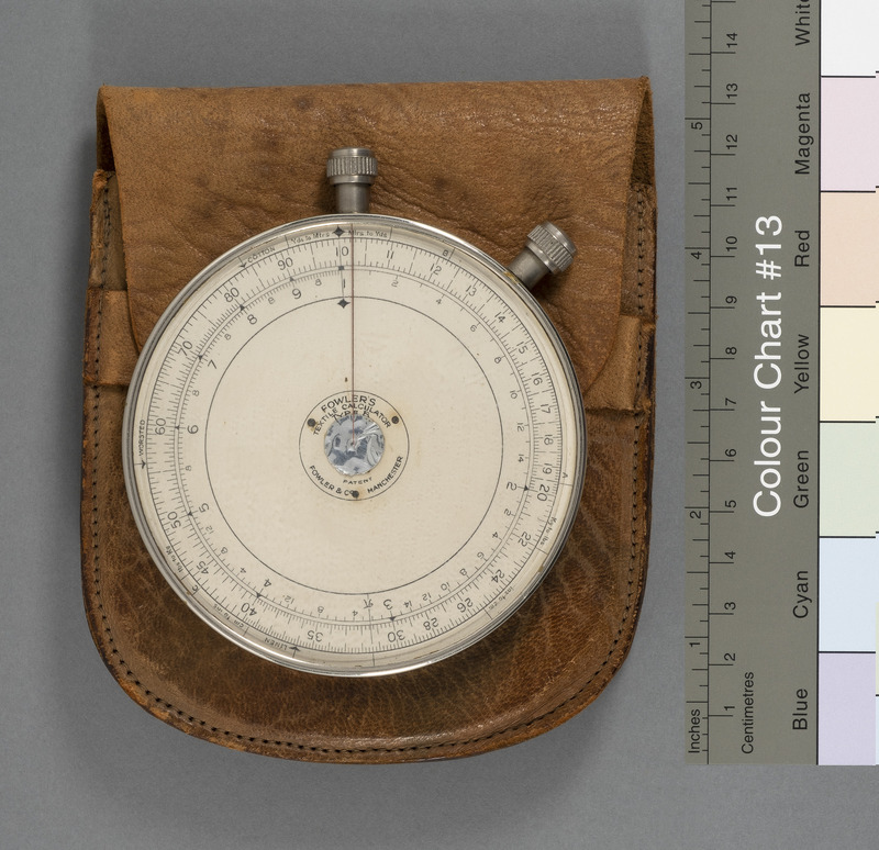 B1-087.1: Fowler Textile Calculator with Leather case: Calculator laid on its case. Image credit: Saltaire Collection