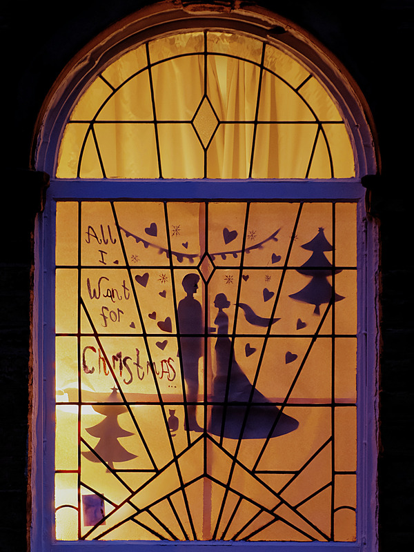 2025.68.3: Saltaire Advent Window (Man and woman). Digital image credit: Saltaire Collection