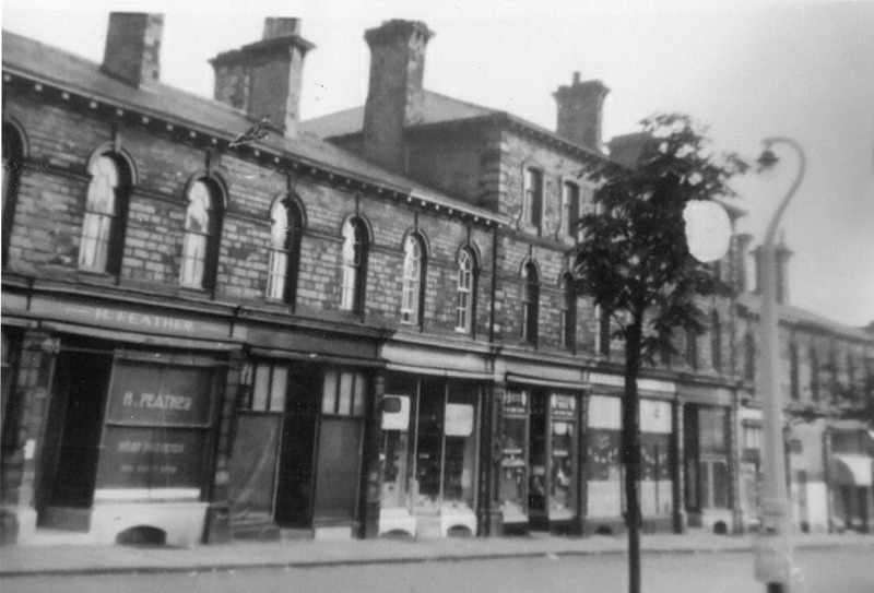 2019.54.1a-b-c-d-e: Shops on VIctoria Road. Digital image credit: Saltaire Collection