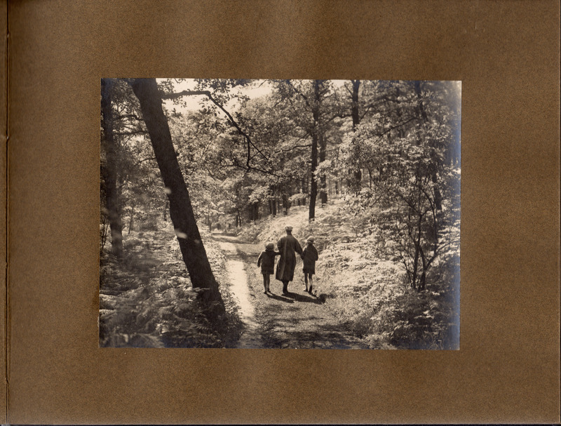 F1a-134: Northcliffe Woods 1920: Page 5 - Woman and 2 children wlaking through Northcliffe Woods. Image credit: Saltaire Collection