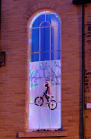 2025.68.6: Saltaire Advent Window (Girl on a bicycle). Digital image credit: Saltaire Collection