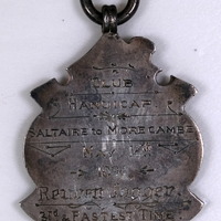 D2-056: Cycling medal: Rear view. Digital image credit: Saltaire Collection