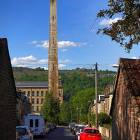 2025.68.115: Salts Mill chimney from Rhodes Street. Digital image credit: Saltaire Collection