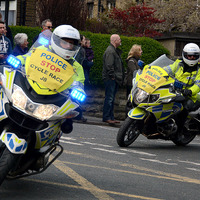 2025.68.80: Saltaire Tour de Yorkshire Police riding. Digital image credit: Saltaire Collection