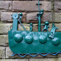 2025.68.41: Boat sculpture by the canal. Digital image credit: Saltaire Collection